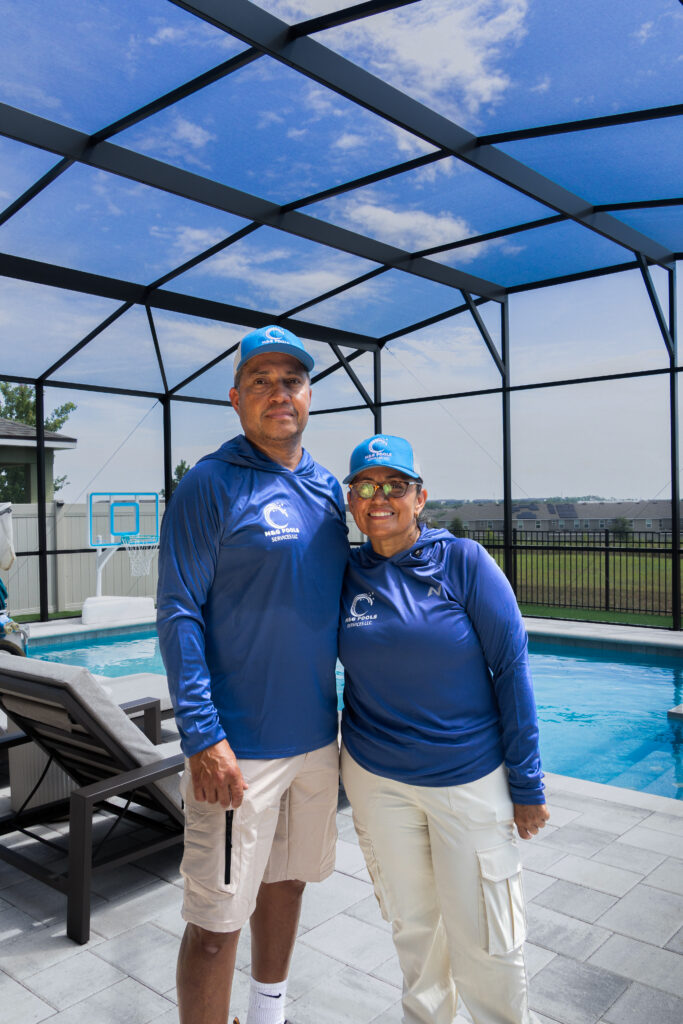 Owner-led M&G Pool Services team at a residential pool in Central Florida